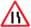 road narrows from right